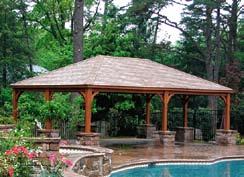Extend your home by adding a hearthside pergola to