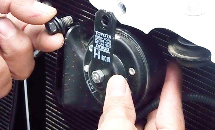 Fig 14 Step 13 On your vehicle unscrew and flip both horns located on the opening.