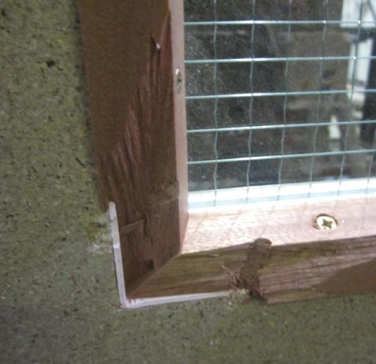 14 Example of a door leaf where the glazing bead has been damaged by impact Damaged glazing i.e. broken glass, damaged glazed beads, poorly fitted glazing system.