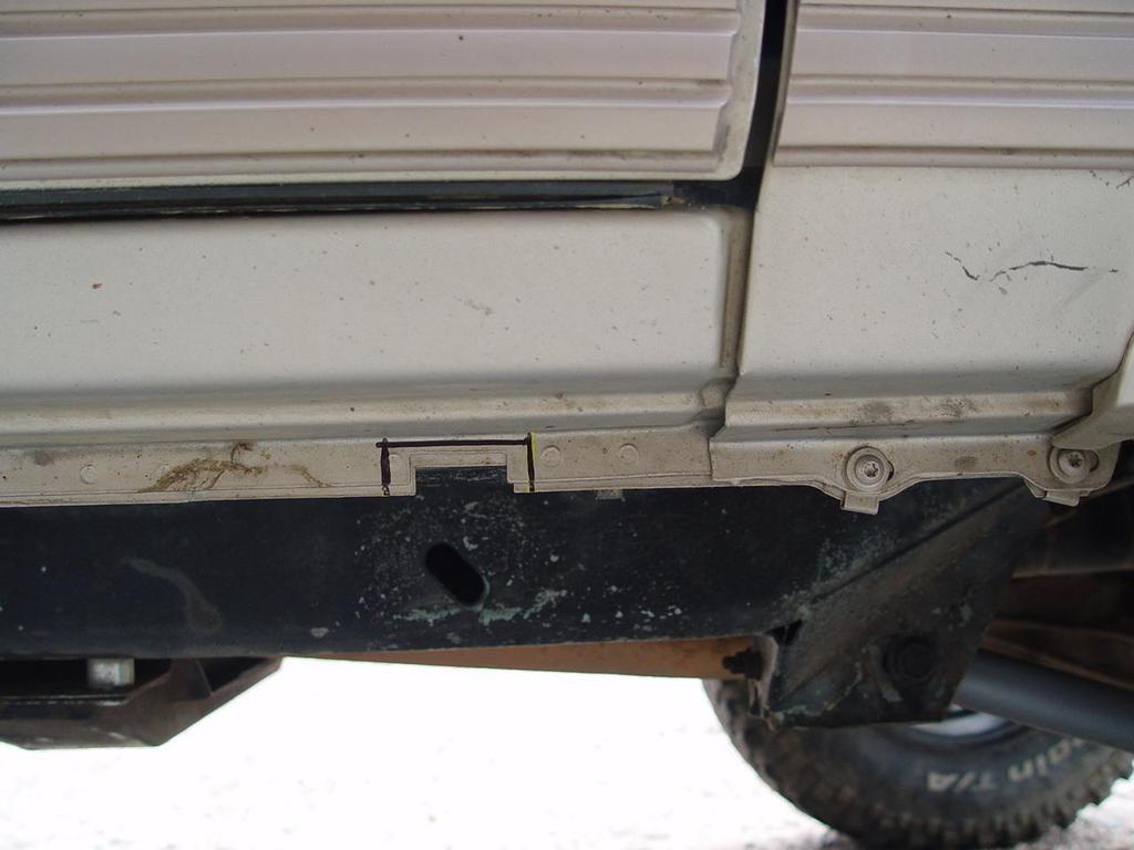 STEP 1: Placement Begin by placing the appropriate rail under your Jeep. RailZ can be identified as left and right by the support tube that has a slight bend in it.