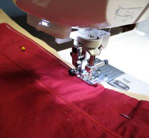 ends. Pin in place. Sew seams along the long sides of the placemat. Leave the ends open.