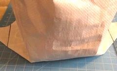 creases for the sides  Trim excess bag off.