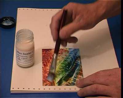 ENCAUSTIC Encaustic paints consist of pigment mixed with wax and resin. When the colors are heated, the wax melts and the paint can be brushed easily. When the wax cools, the paint hardens.