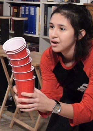 Supplies: Each team needs 8 cups and 15 ping pong balls. If the playing area will not allow balls to bounce they can be thrown instead of bounced. Object: Player 1 begins with 8 cups stacked together.