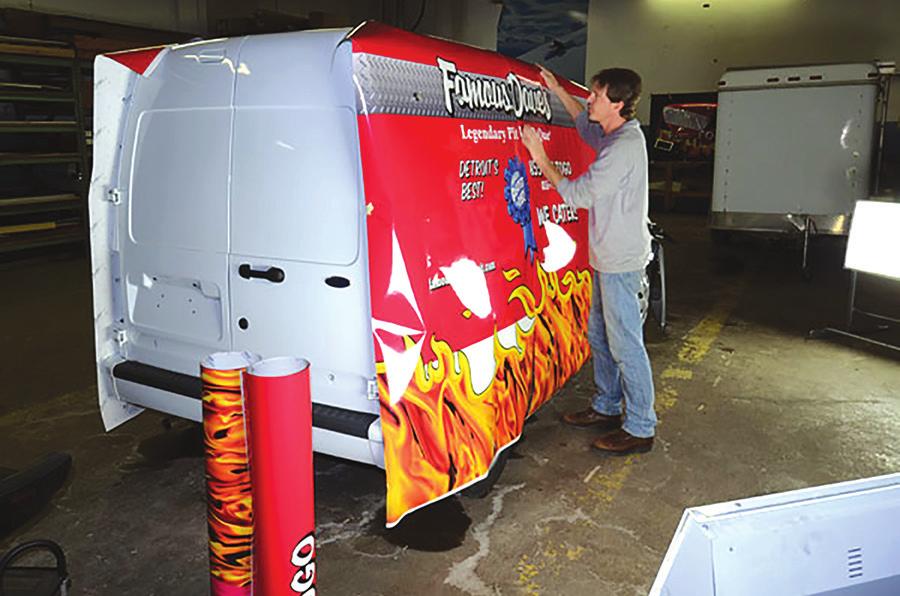 Modern processes involve printing promotional graphics which are then applied to a vehicle.