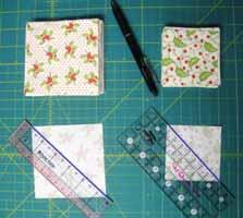 Then gather the Large 7 1/4" x 7 1/4" Background fabric squares and the Small 5 1/4" x 5 1/4" Background fabric squares.