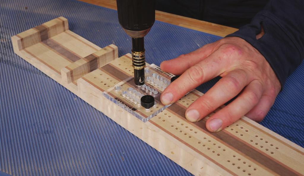 d 3. SET UP THE DRILLING JIG Use the Rockler Small Cribbage Board Template