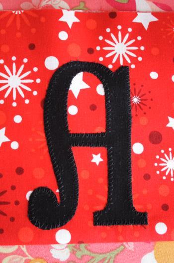 Then applique around the letter.
