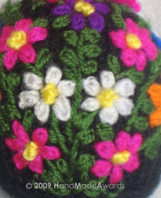 = 10 -*tog2*/repeat in all the stitches = 5 Sew the body and stuff it. Embroider the flowers following the picture.