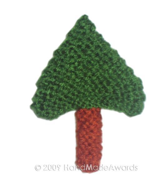 -4 /tog 2/ = 5 -tog 2/3 st/ = 4-2 st/tog 2/ = 3-5 rows. Embroider the flowers at the front. Sew the red tiny button at the front. THE TREE Knit with Green color wool yarn and Make two the same.
