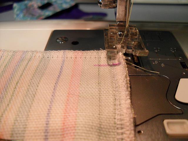 To sew the sides together, mark each side piece at the 1/2 from the top as shown.