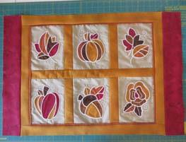 Use curved safety pins to baste the layers together. PHOTO 10 Quilt as desired.