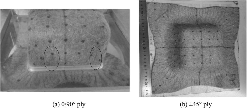 Fig. 8. Wrinkling phenomenon in F450 nonwoven fabric during forming. CD than in MD for 0/90 ply in all of the hemispherical preforming tests.