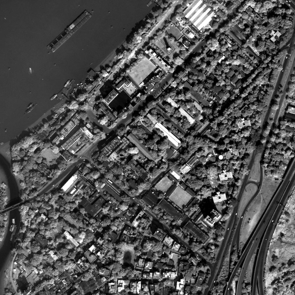 1.1 Characteristics of Remote Sensing Imagery 9 Figure 1.3: Panchromatic (Pan) image with spatial resolution of 0.6m 0.6m corresponding to the same geographical area as shown in Fig. 1.1 acquired using Quickbird satellite.