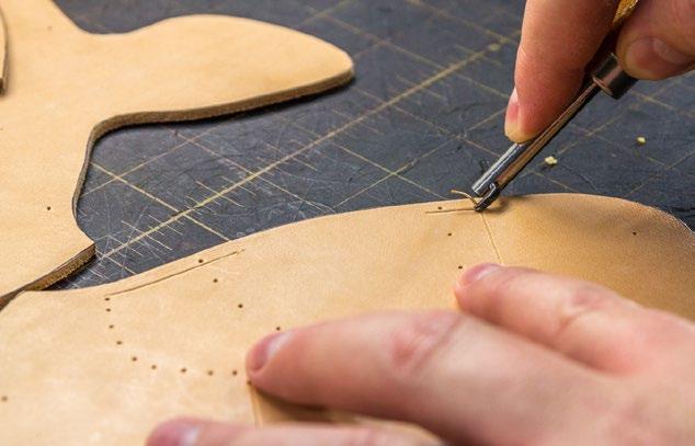 Position the pattern on your leather, then carefully trace around the perimeter of your pattern with a pen or scratch awl.