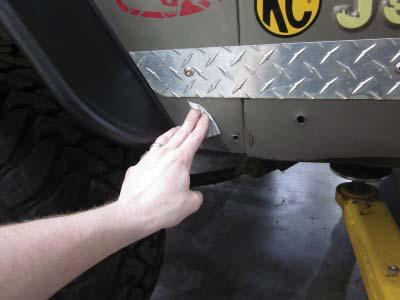 41 42 Attach one Refl ector (LT1-0002) to the side of the vehicle by peeling off the adhesive backing and