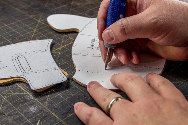 Poke through these dots to make tiny marks in the leather with your scratch awl.