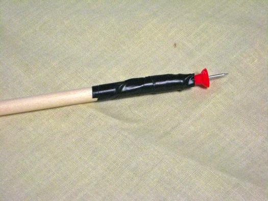 Tools: Drill Hot glue gun Video: http://youtu.be/mgf6xczi5ta How To: Tape a pushpin onto the end of a dowel.
