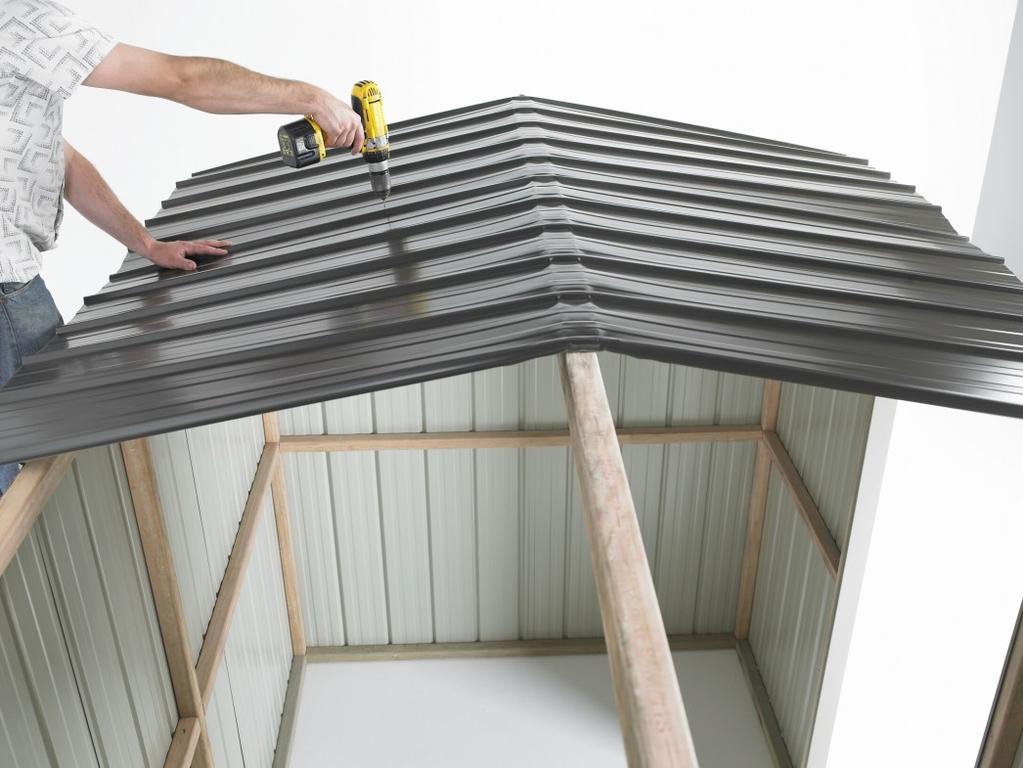 hand side. (For sheds with a Clear Roof Panel, go to the next page). Position the next Roof Sheet.