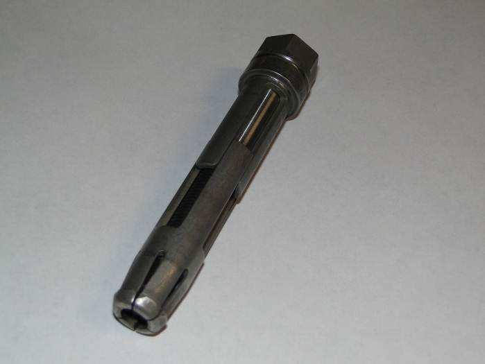 This compliant pressure foot utilized a rotating clamp pad that centered on the tool point and maintained normality tolerances on variable surfaces.