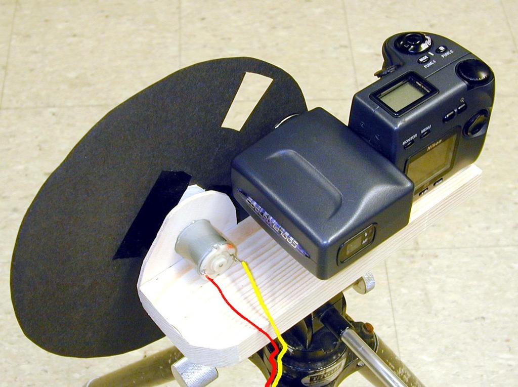 In a simulated, but very real, ballistic range setting students determine the velocity of model rockets in free flight using a rotating drum type synchroballistic camera.