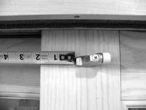 FIGURE 1 FIGURE 2 Top & Bottom Door Bumper Installation TOP OF PANEL Door Bumpers - (2 per panel as described below) Note: You will need: Tape measure Pencil Phillips Head screwdriver From the