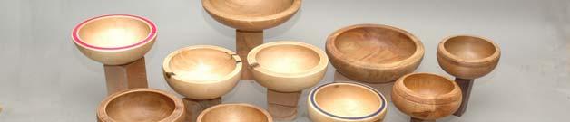 After the oil treated bowls have dried for about one week, each one is polished with the Beal System, adding