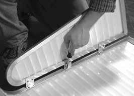 Installing clips is a two-step process: () Insert the curved part of clip into slat joint; () Slide clip onto Canopy Rafter.