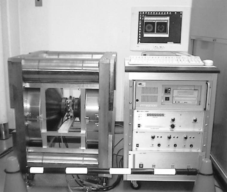 876 T. Haishi et al. / Magnetic Resonance Imaging 19 (2001) 875 880 Fig. 1. MR microscope using a 1.0 T permanent magnet. This system can be installed within a 1.2 m 0.8 m area.