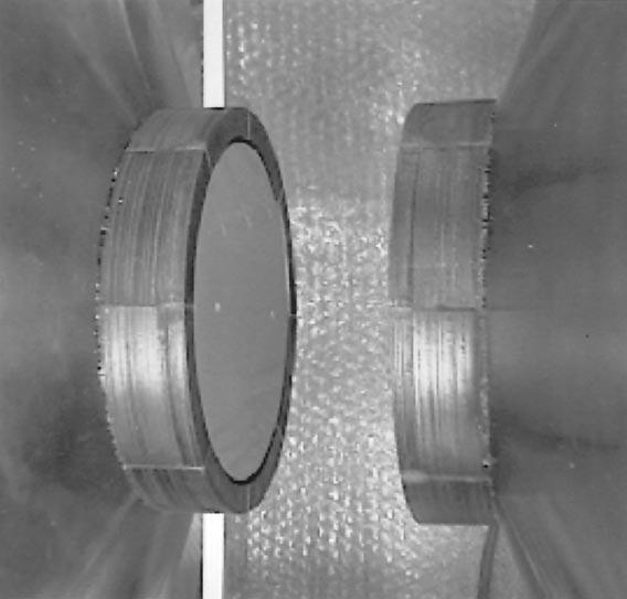 T. Haishi et al. / Magnetic Resonance Imaging 19 (2001) 875 880 877 Fig. 2. Pole pieces of the magnet consist of 14-cm O.D. laminated silicon steel plates.