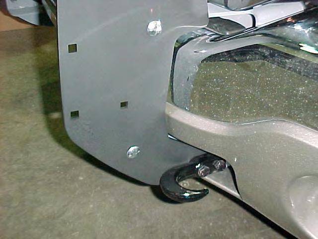 9. Install the Side Members and the supplied Tow Hooks as shown in Photo 5. Leave bolts slightly loose.