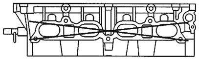 002 in.) Exhaust Manifold Side: 0.08 mm (0.003 in.) Figure 6.