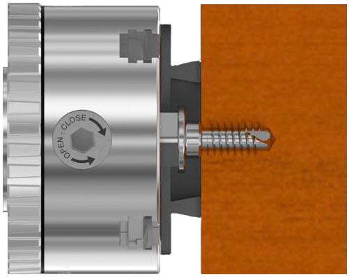 1. Position the hole in your work piece on the chucking screw pilot and align the hole axis to the screw. 2.