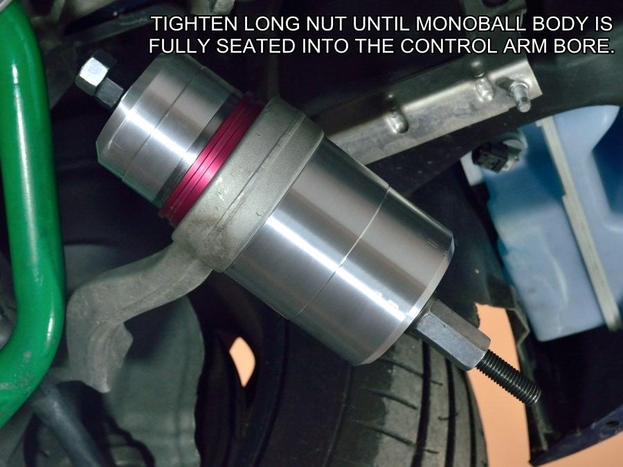 Use the entire contents of one tube on each control arm/monoball housing pair. Your 15 minute time limit has started, proceed immediately to the next step.