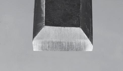tion of the edge material. "If a blacksmith will a keen edge win, they must forge thick and then file thin." The ferrules of the handle are made from pipe or conduit.