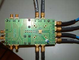 a complete evaluation board from the T/H vendor, with the T/H already mounted, was used. FIGURE 5-2. CLOSE-UP OF THE T/H PCB. 5.1.