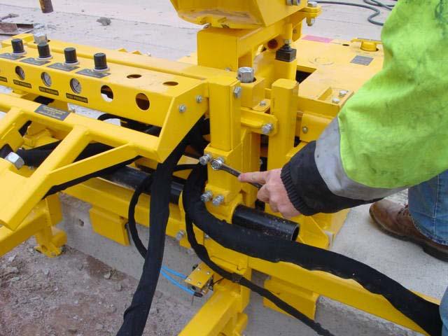 ADJUSTING THE HEIGHT OF THE DRILL SYSTEMS (with overlay) On those occasions where there may be an asphalt