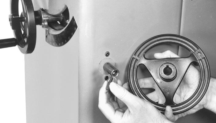 3. Push the handwheel snugly against the fiber washer and tighten the set screw. 4. Install lock knob (F) Fig.