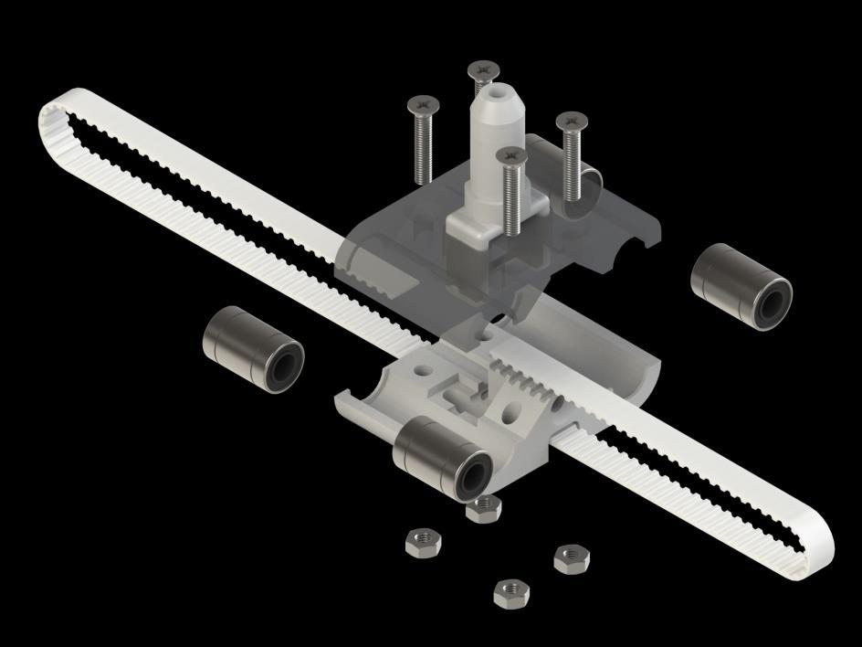 6. Place the linear bearings (19) on the bottom half of the carriage (18), along the side channels, and one