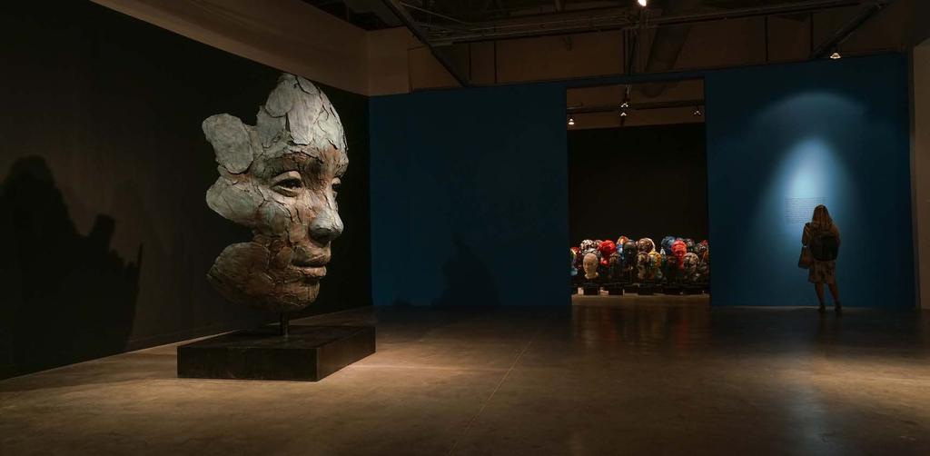 The massive installation Accumulation of Disorder comprises dozens of versions of the same head, each uniquely finished by the artist in automotive paint.