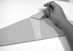Section 8: Installing the Tail Group (Horizontal and Vertical Fin) Step 6 With the horizontal stabilizer properly aligned, carefully mark the stabilizer with a felt-tipped pen or pencil where it