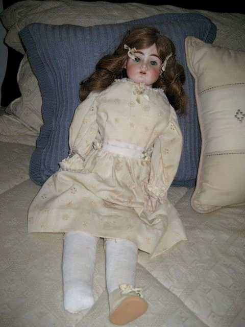 10 Julia s doll today, almost 100 years old, with only one shoe missing, is a connection to the past that ultimately