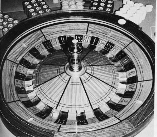 A roulette wheel has 38 compartments: 0 and 00 are green 1--36: half red and half black What is the probability of: The number 7? Any number from 1--12?
