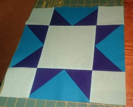 Assembling the Block Repeat to sew the bottom row to the middle