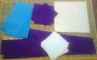 Cutting Instructions for the Celestial Stars Wall Hanging From the light (aqua) fabric, cut: 1-6-1/2 x 6-1/2