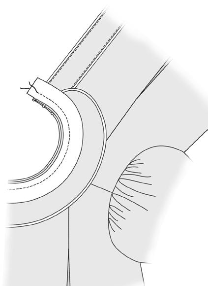 5. Hand whip folded edge of corded piping seam to in of sleeve or topstitch using an edge stitch foot, stitching 1/16 inch from folded edge (fig. 20). 6.