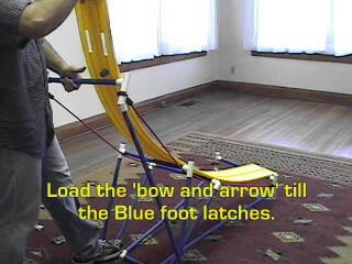 If the Start section slides off, the Blue foot is on the wrong side of the horizontal support. 3. Load the 'bow and arrow' till the Blue foot latches.