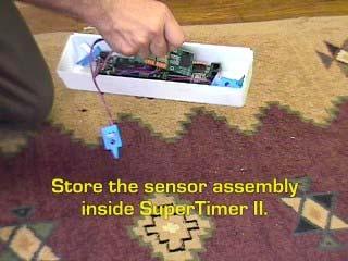 Then, just feed them back thru SuperTrack and slide the finish line board out. 3. Store the sensor assembly inside SuperTimer II.