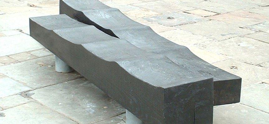 CHARRED GREEN OAK RIPPLE BENCH The Charred Green Oak Ripple Bench provides a robust contemporary public seating solution for any scheme.