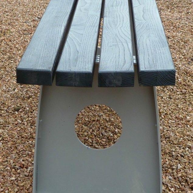 The Bench is available in various hardwoods and finishes, ranging from seasoned oak to a charred and scrubbed
